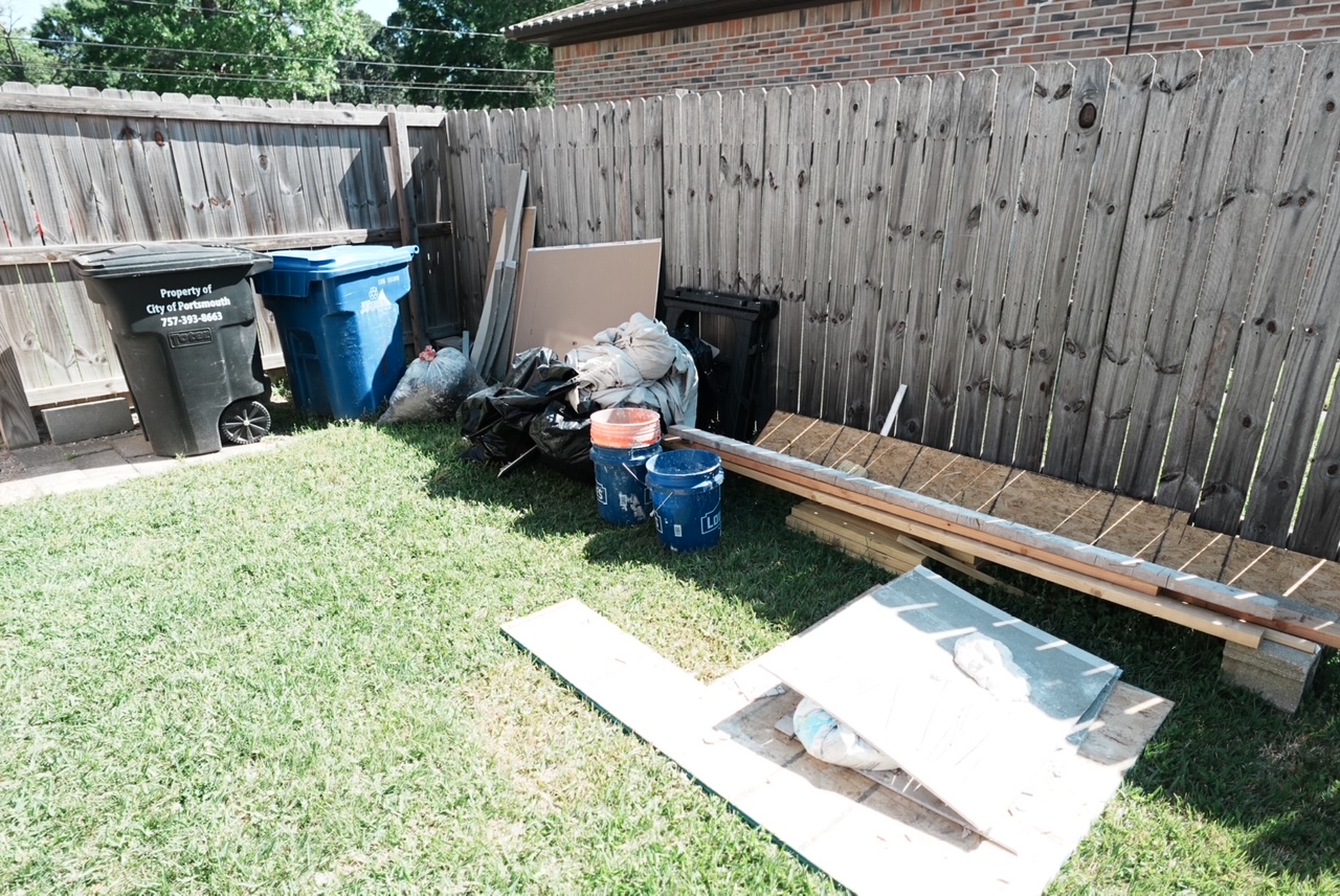 Backyard debris cleanup — before