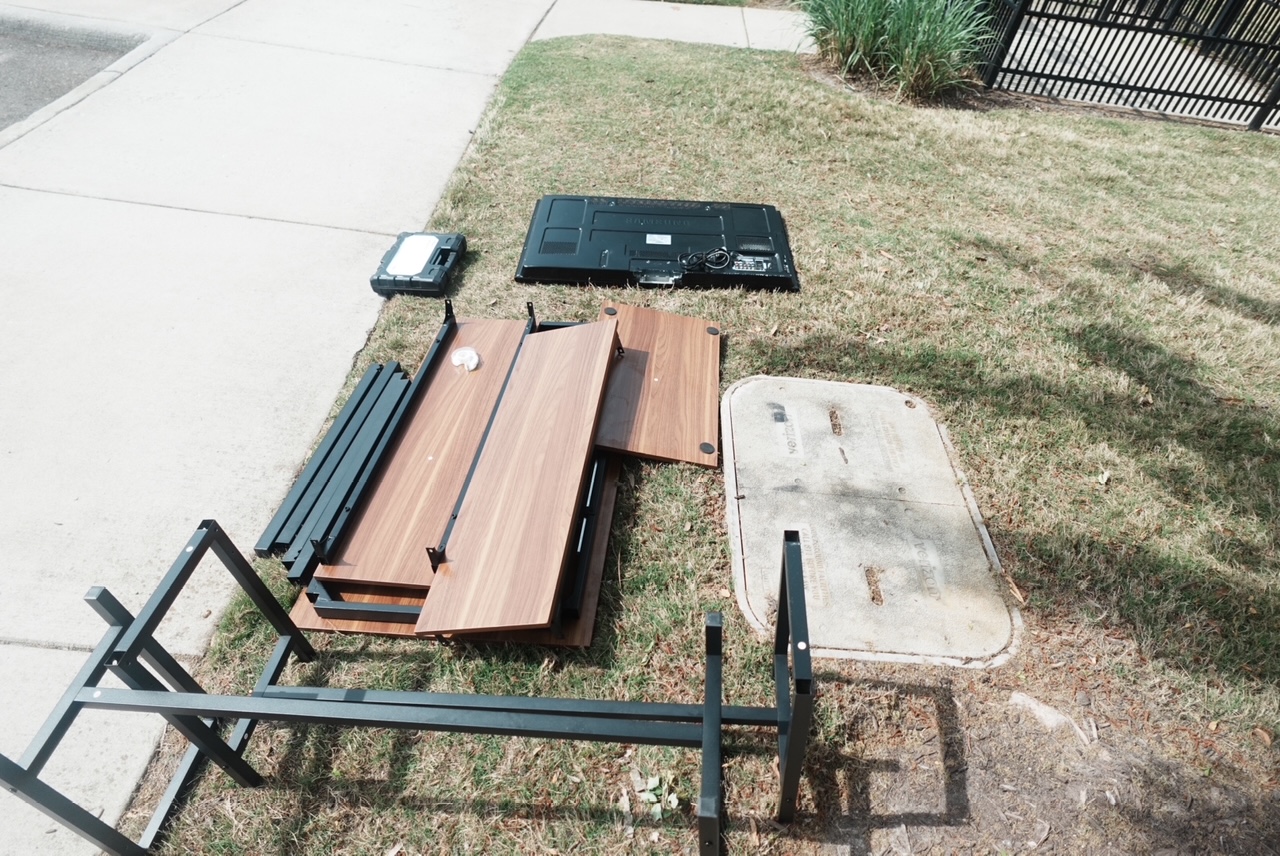 Curbside furniture and TV haul — before